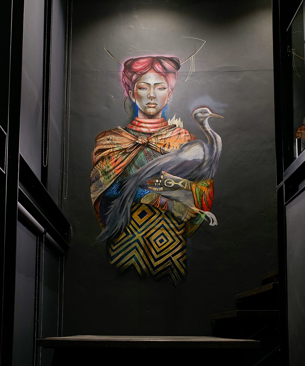 A mural by tattoo artist Warren from Baked Ink marks the entrance to Fyn, depicting the fusion between African and Japanese cultures on the menu