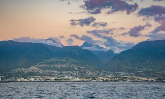 Réunion as viewed from a catamaran at sunset