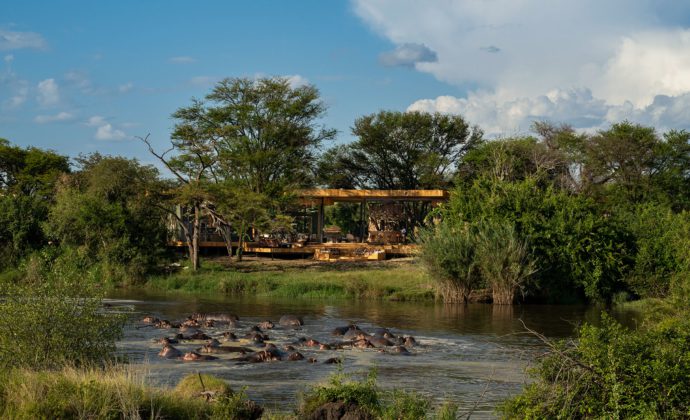 Tanzania Grumeti Serengeti River Lodge exterior with hippo pod